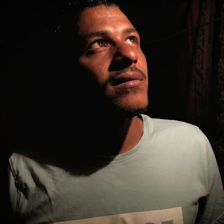 Alexis Rao, Lead Design Curator at NovelHarborChart, reviewing corporate floral arrangements